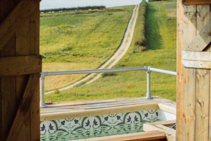 Hot tub jacuzzi looking out to the open field