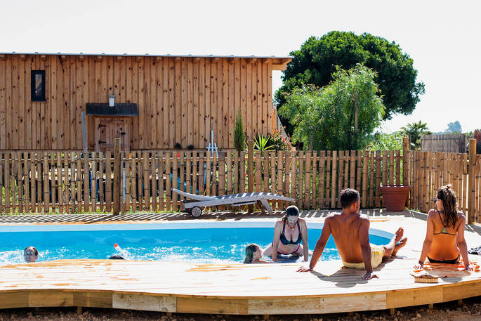 Sit out on the wooden deck and dip your toes in the pool at The Magic Ranch in Cadiz, Spain